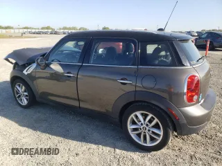 2012 MINI Countryman with VIN WMWZB3C58CWM03815, listed as a Copart auction lot 50097405 with 84,137 mi miles and Salvage Title. Bid and sale history available at DreamBid. Image 2.