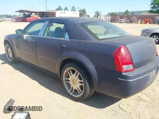2006 Chrysler 300 Touring with VIN 2C3KA53G86H112808, listed as a IAAI auction lot 42036392 with Not Provided miles. Bid and sale history available at carsss.com. Image 3.
