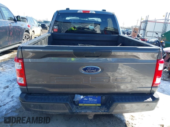 2021 Ford F-150 XL z VIN 1FTEW1C51MFC94173, wystawiony jako IAAI lot #41628222 z przebiegiem 23 266 mil mil oraz . Historia ofert i sprzedaży dostępna na DreamBid. Obrazek 17.