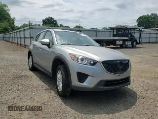 2013 Mazda CX-5 Sport with VIN JM3KE2BE6D0110272, listed as a Copart auction lot 57570725 with 124,475 mi miles and Salvage title. Bid and sale history available at DreamBid. Image 14.