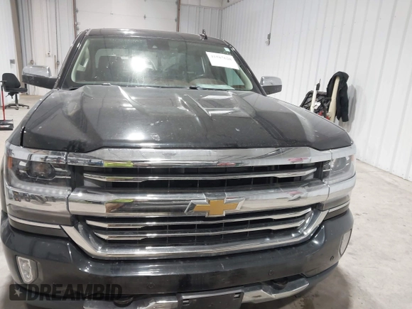 2016 Chevrolet Silverado 1500 High Country with VIN 3GCUKTEC8GG221707, listed as a IAAI auction lot 41587628 with 63,740 mi miles and . Bid and sale history available at DreamBid. Image 12.