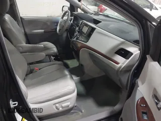2014 Toyota Sienna Ltd with VIN 5TDDK3DC7ES072058, listed as a IAAI auction lot 41548332 with 153,742 mi miles. Bid and sale history available at carsss.com. Image 5.