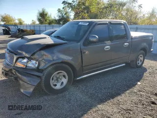 2002 Ford F-150 Harley Davidson with VIN 1FTRW07362KC77880, listed as a Copart auction lot 75259594 with 103,591 mi miles and Salvage Title. Bid and sale history available at carsss.com. Image 1.