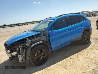 2018 Jeep Cherokee Latitude with VIN 1C4PJLCB0JD574084, listed as a Copart auction lot 51769005 with 115,774 mi miles and Salvage title. Bid and sale history available at DreamBid. Image 1.