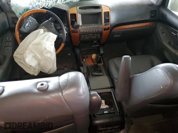 2005 Lexus GX 470 with VIN JTJBT20XX50073695, listed as a Copart auction lot 50595385 with 162,617 mi miles and Salvage Title. Bid and sale history available at carsss.com. Image 8.