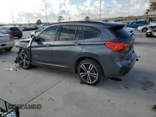 2018 BMW X1 sDrive28i with VIN WBXHU7C3XJ5H38906, listed as a Copart auction lot 36572583 with 71,860 mi miles. Bid and sale history available at carsss.com. Image 2.