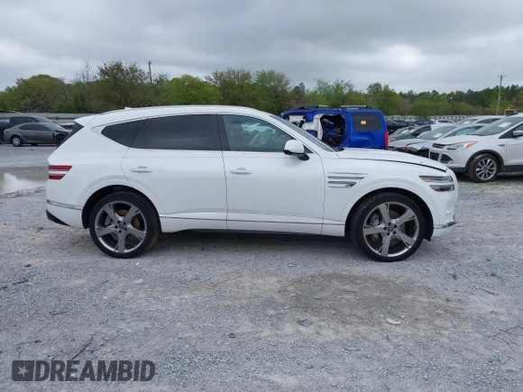 2023 Genesis GV80 z VIN KMUHCESC7PU109750, wystawiony jako IAAI lot #41950393 z przebiegiem 27 229 mil mil oraz . Historia ofert i sprzedaży dostępna na DreamBid. Obrazek 13.