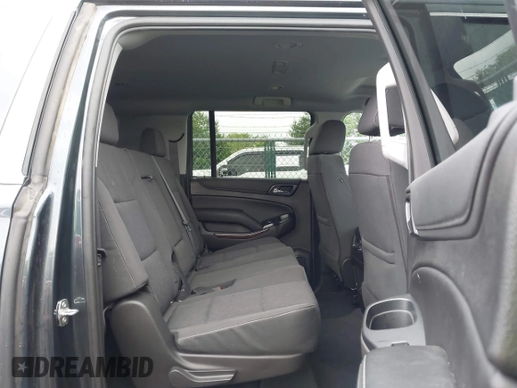 2019 Chevrolet Suburban LS with VIN 1GNSKGKC7KR244916, listed as a IAAI auction lot 42315858 with 69,555 mi miles and . Bid and sale history available at DreamBid. Image 8.