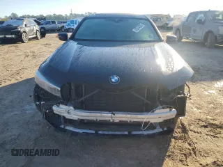 2020 BMW 7 Series 740i with VIN WBA7T2C0XLCE02429, listed as a Copart auction lot 42574835 with 73,970 mi miles and Salvage Title. Bid and sale history available at carsss.com. Image 5.