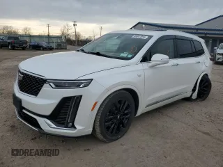 2022 Cadillac XT6 Premium Luxury with VIN 1GYKPFRS2NZ120147, listed as a Copart auction lot 49047855 with 59,691 mi miles and Salvage Title. Bid and sale history available at carsss.com. Image 1.