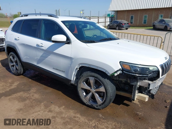 2019 Jeep Cherokee Limited with VIN 1C4PJLDBXKD487843, listed as a IAAI auction lot 41979449 with 104,545 mi miles. Bid and sale history available at carsss.com. Image 1.