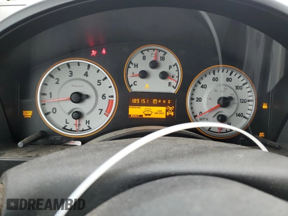 2011 Nissan Titan Pro-4X z VIN 1N6BA0EC0BN322228, wystawiony jako Copart lot #47617305 z przebiegiem 189 151 mil mil oraz Szkoda całkowita • Salvage title. Historia ofert i sprzedaży dostępna na DreamBid. Obrazek 9.