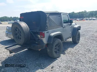 2015 Jeep Wrangler Freedom Edition with VIN 1C4AJWAG4FL589769, listed as a IAAI auction lot 42704488 with 194,414 mi miles and . Bid and sale history available at DreamBid. Image 4.