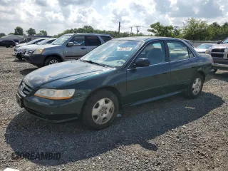 2001 Honda Accord EX with VIN 1HGCG16571A073168, listed as a Copart auction lot 65041825 with 101,277 mi miles and Clean title. Bid and sale history available at DreamBid. Image 1.