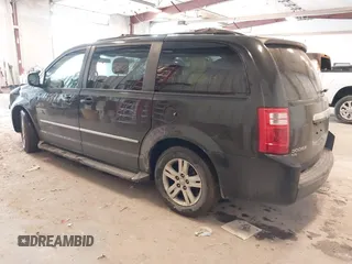 2010 Dodge Grand Caravan Crew with VIN 2D4RN6DX1AR438135, listed as a IAAI auction lot 41734378 with 57,041 mi miles and . Bid and sale history available at DreamBid. Image 3.