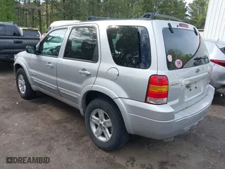 2005 Ford Escape Hybrid with VIN 1FMCU95H75KD90560, listed as a IAAI auction lot 42048840 with 137,223 mi miles. Bid and sale history available at carsss.com. Image 3.