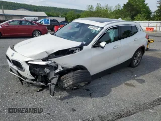 2020 BMW X2 xDrive28i z VIN WBXYJ1C07L5R22552, wystawiony jako Copart lot #56876295 z przebiegiem 90 107 mil mil oraz Szkody całkowita. Historia ofert i sprzedaży dostępna na DreamBid. Obrazek 1.