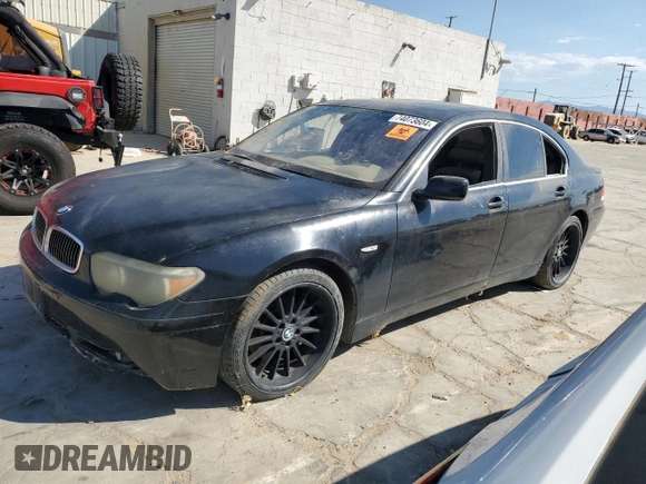 2002 BMW 7 Series 745i with VIN WBAGL634X2DP57617, listed as a Copart auction lot 74073604 with 153,666 mi miles and Clean Title. Bid and sale history available at DreamBid. Image 1.