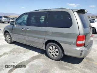 2005 Kia Sedona LX with VIN KNDUP132956661322, listed as a Copart auction lot 71431874 with 101,875 mi miles and Salvage Title. Bid and sale history available at carsss.com. Image 2.