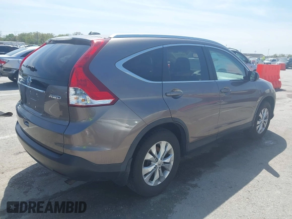 2014 Honda CR-V EX-L with VIN 5J6RM4H70EL096555, listed as a IAAI auction lot 42038062 with 113,601 mi miles. Bid and sale history available at carsss.com. Image 4.