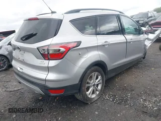 2017 Ford Escape SE with VIN 1FMCU0G97HUA46463, listed as a IAAI auction lot 41989263 with 130,168 mi miles and . Bid and sale history available at DreamBid. Image 4.