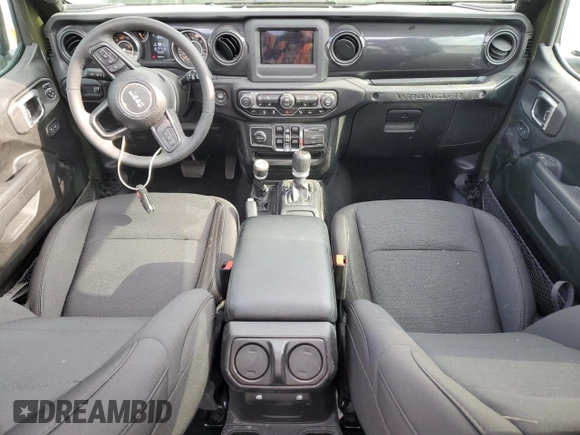 2023 Jeep Wrangler Sport S with VIN 1C4HJXDG0PW629815, listed as a Copart auction lot 53826875 with 9,260 mi miles and Salvage Title. Bid and sale history available at DreamBid. Image 8.