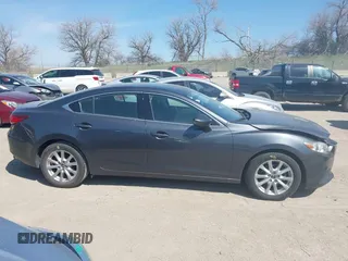 2016 Mazda 6 i Sport with VIN JM1GJ1U56G1473526, listed as a IAAI auction lot 41977842 with 85,542 mi miles and . Bid and sale history available at DreamBid. Image 13.