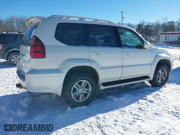 2006 Lexus GX with VIN JTJBT20XX60123979, listed as a IAAI auction lot 41863064 with 263,799 mi miles. Bid and sale history available at carsss.com. Image 4.
