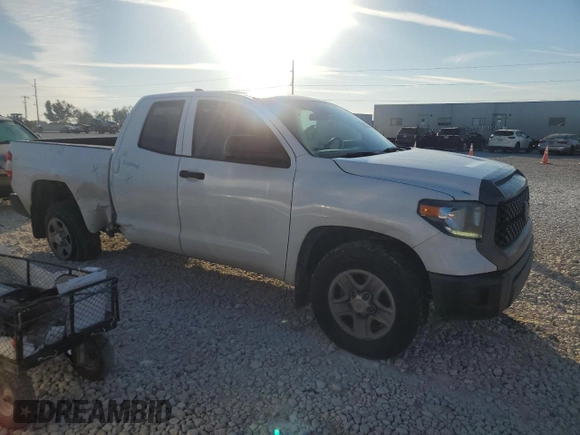 2020 Toyota Tundra 2WD SR with VIN 5TFRY5F19LX271230, listed as a Copart auction lot 82907174 with 107,352 mi miles and Salvage Title. Bid and sale history available at carsss.com. Image 4.