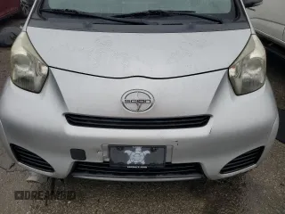 2013 Scion iQ with VIN JTNJJXB08DJ025554, listed as a Copart auction lot 88923885 with 110,378 mi miles and Salvage title. Bid and sale history available at DreamBid. Image 12.