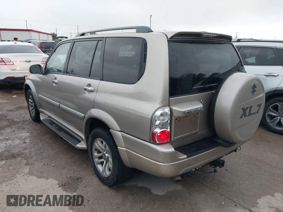 2004 Suzuki XL-7 LX with VIN JS3TX92V244114426, listed as a IAAI auction lot 42112014 with 169,377 mi miles. Bid and sale history available at carsss.com. Image 3.