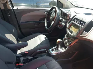 2013 Chevrolet Sonic LT with VIN 1G1JC5SH6D4201811, listed as a IAAI auction lot 42082122 with 212,944 mi miles and . Bid and sale history available at DreamBid. Image 5.