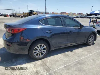 2015 Mazda 3 i Grand Touring with VIN 3MZBM1W7XFM135576, listed as a Copart auction lot 54060755 with 137,374 mi miles and Salvage title. Bid and sale history available at DreamBid. Image 3.