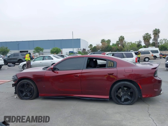 2019 Dodge Charger R/T with VIN 2C3CDXCT2KH749207, listed as a IAAI auction lot 42120658 with 52,330 mi miles and . Bid and sale history available at carsss.com. Image 14.