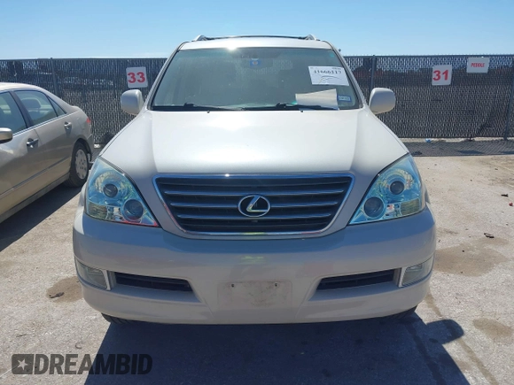 2003 Lexus GX 470 with VIN JTJBT20X430013005, listed as a IAAI auction lot 41666117 with 225,332 mi miles. Bid and sale history available at carsss.com. Image 12.
