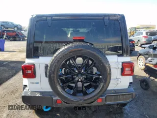 2023 Jeep Wrangler Sahara with VIN 1C4JJXP67PW630321, listed as a Copart auction lot 54579155 with 40,024 mi miles and Clean Title. Bid and sale history available at DreamBid. Image 6.
