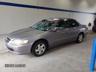 2000 Honda Accord EX z VIN 1HGCG6673YA139658, wystawiony jako Copart lot #73036004 z przebiegiem 281 401 mil mil oraz Szkoda całkowita • Salvage title. Historia ofert i sprzedaży dostępna na DreamBid. Obrazek 1.