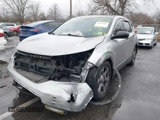 2019 Honda CR-V EX-L with VIN 2HKRW2H89KH669532, listed as a IAAI auction lot 41039943 with 103,252 mi miles. Bid and sale history available at carsss.com. Image 2.