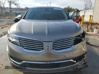 2016 Lincoln MKX Reserve z VIN 2LMPJ6LR7GBL74185, wystawiony jako Copart lot #87799275 z przebiegiem 89 977 mil mil oraz Szkoda całkowita • Salvage title. Historia ofert i sprzedaży dostępna na DreamBid. Obrazek 5.