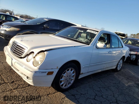 2002 Mercedes-Benz E-Class with VIN WDBJF82JX2X072551, listed as a Copart auction lot 83607634 with 139,645 mi miles and Salvage Title. Bid and sale history available at carsss.com. Image 1.