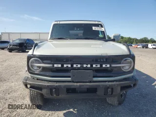 2023 Ford Bronco with VIN 1FMEE5BP0PLC06549, listed as a Copart auction lot 58703305 with 28,051 mi miles and Salvage title. Bid and sale history available at DreamBid. Image 5.