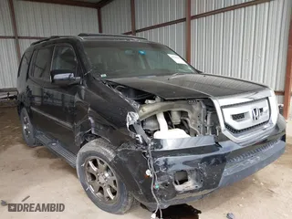 2009 Honda Pilot Touring with VIN 5FNYF388X9B025547, listed as a IAAI auction lot 41784186 with 180,097 mi miles. Bid and sale history available at carsss.com. Image 1.