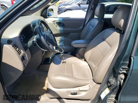 2002 Ford Escape XLT Choice with VIN 1FMCU04172KD00268, listed as a Copart auction lot 61284675 with 118,016 mi miles and Salvage title. Bid and sale history available at DreamBid. Image 7.