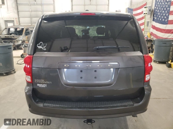 2015 Dodge Grand Caravan SE with VIN 2C4RDGBG6FR668740, listed as a Copart auction lot 50211885 with 129,695 mi miles and Salvage Title. Bid and sale history available at DreamBid. Image 6.