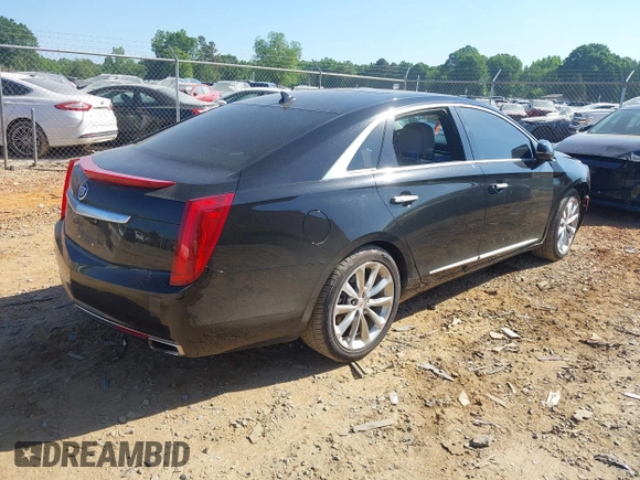 2014 Cadillac XTS Luxury with VIN 2G61M5S30E9229758, listed as a IAAI auction lot 42179952 with 125,848 mi miles and . Bid and sale history available at DreamBid. Image 4.