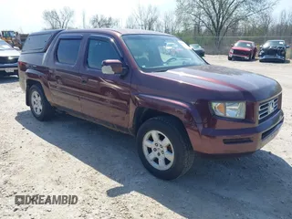 2007 Honda Ridgeline RTL z VIN 2HJYK165X7H512811, wystawiony jako IAAI lot #42206930 z przebiegiem 273 295 mil mil oraz . Historia ofert i sprzedaży dostępna na DreamBid. Obrazek 1.