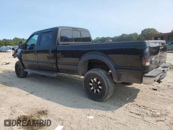 2002 Ford F-350 XL with VIN 1FTSW31S22EA86524, listed as a Copart auction lot 59212805 with 193,901 mi miles and Salvage title. Bid and sale history available at DreamBid. Image 2.