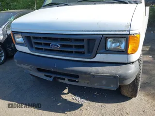 2004 Ford Econoline Cargo Commercial with VIN 1FTNE24W04HA50342, listed as a IAAI auction lot 42145274 with 158,408 mi miles and . Bid and sale history available at carsss.com. Image 6.