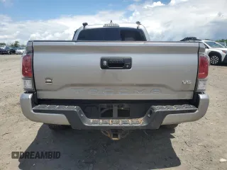2020 Toyota Tacoma SR5 with VIN 3TMDZ5BN5LM090020, listed as a Copart auction lot 58192835 with 107,156 mi miles and Salvage title. Bid and sale history available at DreamBid. Image 6.