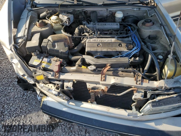 1989 Mitsubishi Galant with VIN JA3BR56V1KZ052149, listed as a Copart auction lot 69987544 with 74,232 mi miles and Salvage Title. Bid and sale history available at DreamBid. Image 11.